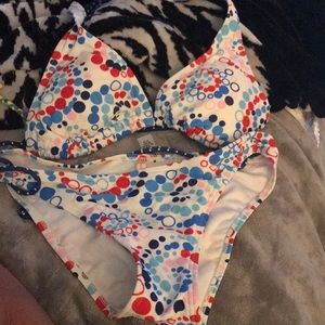 Top is a size large and bottom is a size medium. Like new